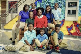Group photo of Kira Orange Jones and kids